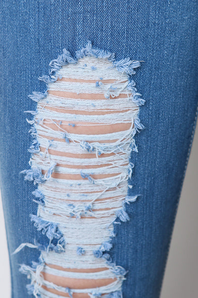 Distressed Mid Rise Skinny Jeans