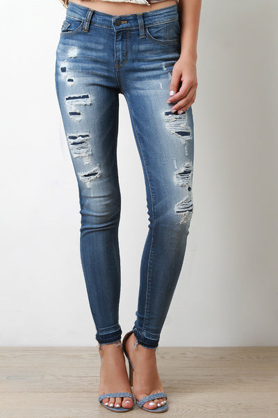 Mid Rise Undone Distressed Denim Jeans